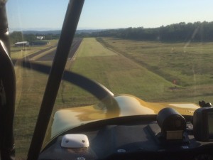 On Final to 22R - note long grass vs Rwy 22R