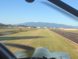 Short Final Rwy 4L - Runway 4L end markers are approx where the tree shadow intersects the Rwy!