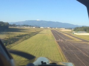 On final approach Rwy 4L - note end of paved 4R, PAPI LIGHTS beyond on grass & Rwy 4L beyond!